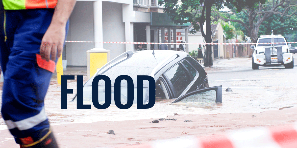 flooded street with car sinking